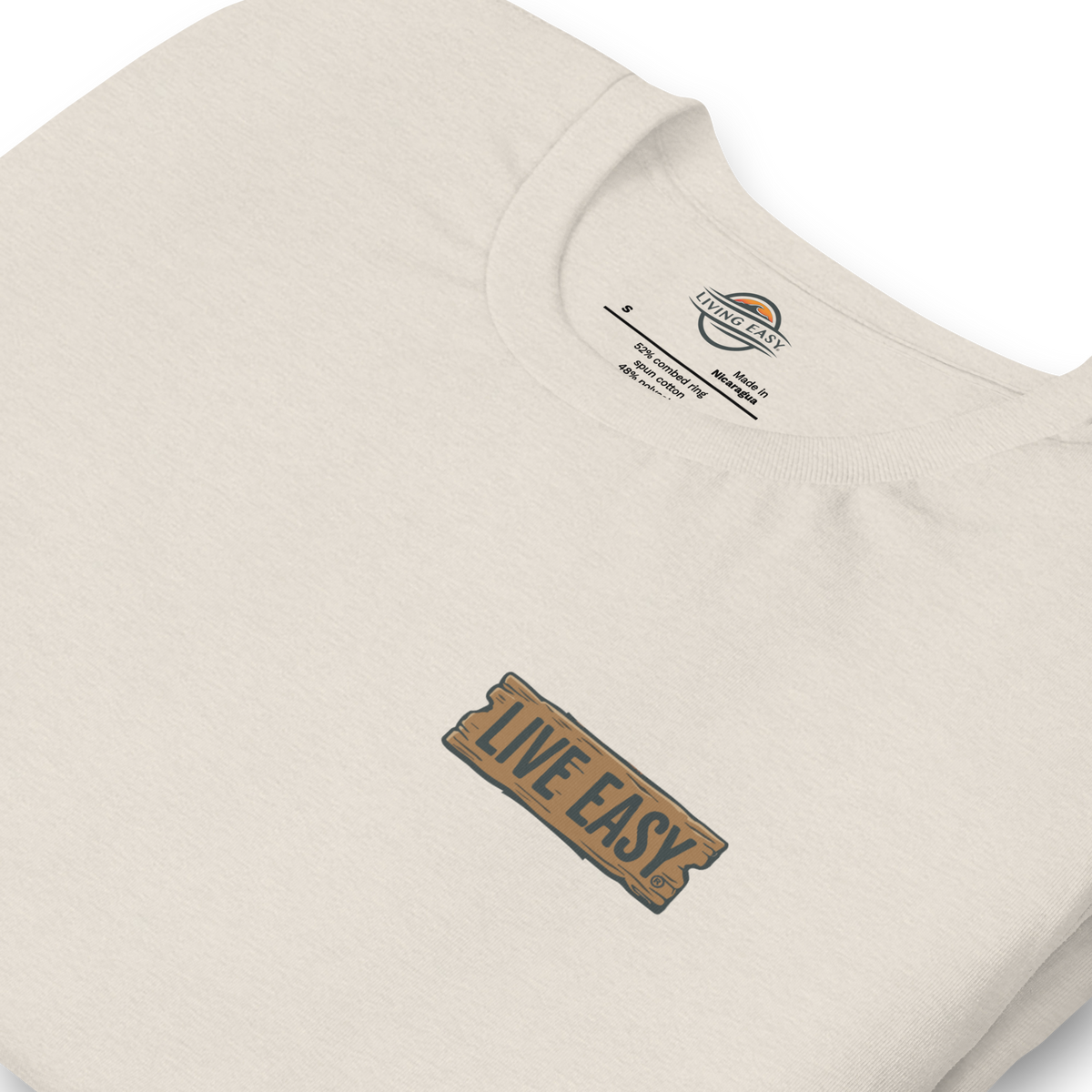 Close-up of a beige sweatshirt with 'Live Easy' logo and brand label.